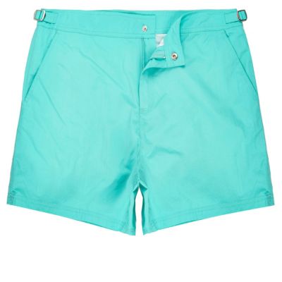 Bright green swim shorts